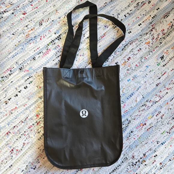 Lululemon Small Black and White Snap Closure Reusable Waterproof Bag - Picture 1 of 5